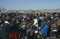 Busy market scene with brightly dressed women.Dogon country Colorful