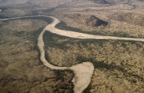 Aerial view over dried up river.