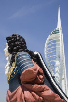 The Spinnaker Tower the tallest public viewing platforn in the UK at 170 metres on Gunwharf Quay with old ships bowsprit figurehead in the foreground