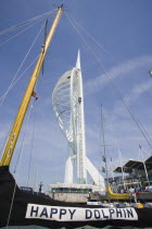 The Spinnaker Tower the tallest public viewing platforn in the UK at 170 metres on Gunwharf Quay with moorings in the foreground