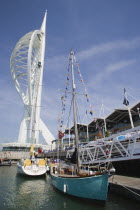 The Spinnaker Tower the tallest public viewing platforn in the UK at 170 metres on Gunwharf Quay with moorings in the foreground