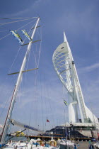 The Spinnaker Tower the tallest public viewing platforn in the UK at 170 metres on Gunwharf Quay with moorings in the foreground