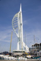 The Spinnaker Tower the tallest public viewing platforn in the UK at 170 metres on Gunwharf Quay with moorings in the foreground