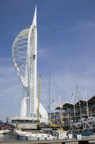 The Spinnaker Tower the tallest public viewing platforn in the UK at 170 metres on Gunwharf Quay with moorings in the foreground