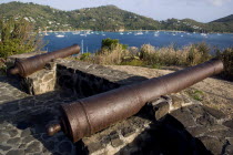 Canon on the 18th Century Hamilton Battery overlooking Admiralty Bay and moored yachts