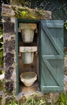 Francia plantation house traditional water filtration system through different thickness coral containers which reflects the natural water filtration system of the island