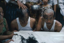 Ritual head shaving of initiate monks.Burma Rangoon
