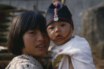 Portrait of two Akha tribe children near Chiang Rai.