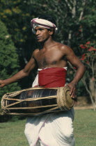 Perahera Buddhist festival.  Traditional drummer.