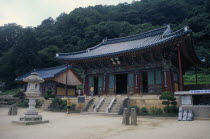 Shinhungsa Temple.  Exterior of Zen meditation temple first built in 653 AD.  Rebuilt in 1645 and again after the Korean War after twice being burnt to the ground.