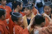 10-12 year old girls called tekomae in traditional costume during July Gion Matsuri from Uemachi neighborhood Festival