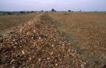 Pebble bund made to catch rainwater runoff