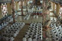 The Cao Dai Holy See midday mass in the main temple