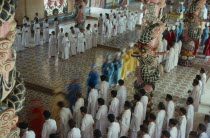 The Cao Dai Holy See procession of priests in the main temple