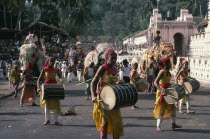Festival procession with musicians and elephants