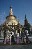 Shwedagon Pagoda.  Initiation of Buddhist novices at Shinpyu ceremony.Burma Myanmar  Yangon Rangoon Shwe Dagon