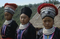 Meo women wearing head dresses decorated with silver coins to indicate wealth.Burma Myanmar