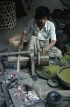 Man working in lacquer factory workshop.Burma Pagan Bagan Myanmar