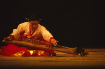 Musician at the National Theatre playing a kayakum Theater