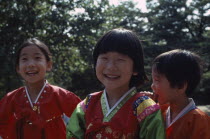 Girls wearing traditional dress.