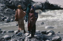 Pilgrims bathing in snow melted water at Gormuich the Cows Mouth one of the sources of the Ganges