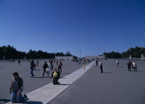 Pilgrims on knees making thier way toward the church & shrine