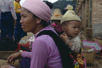 Dai mother with child on her back
