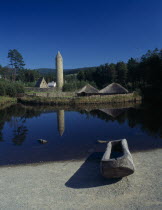 View over Crannog and Round Tower reflected in the water