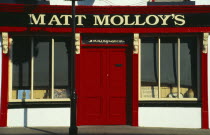 Matt Malloys traditional Pub front with bright red door