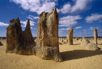 Rock pinnacles in desert landscape.