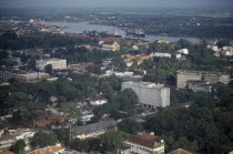 Elevated view over city architecture and the large white United States Embassy building