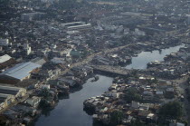 Aerial view over city architecture and river