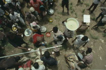 People displaced by civil war queue for UN food aid.United Nations World Food Programme