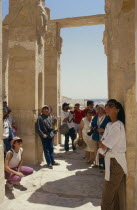 Tourist group visiting archaeological site.