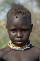 Head and shoulders portrait of Turkana boy