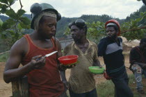 Bauxite miners on lunch break.