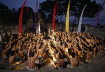 Kechak dancers forming human mandala. The Kechak dance tells the story of Prince Rama and his quest to rescue his wife Sita from the demon king RavanaMonkey Dance