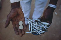 Peter Makfero travels 300km every fortnight to buy fish from Lake Malawi to resell.  His village credit union lent him the money to start this business.Micro credit