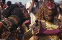 Masked dancers at Bapende tribe Gungu Festival.  Zaire Pende