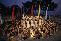 Kechak dancers forming human mandala.  The Kechak dance tells the story of Prince Rama and his quest to rescue his wife Sita from the demon king Ravana.kecak
