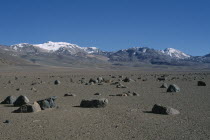 Salar de Uyuni.  Desert landscape scattered with rocks near Laguna Verde.