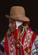 Portrait of boy from Tinqui wearing typical hat and poncho. Cordillera Oriental Cuzco Cusco Cordillera Oriental Cuzco Cusco