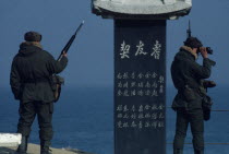 Guards at east coast look out point watching for North Koreans attempting to infiltrate by sea.