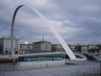 Millennium Bridge. Large white arch with suspended platform over the River Tyne