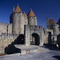 Fortified old town walls La Cite entrance  General view