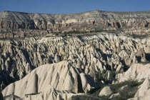 Valley with peaks and pinnacles of volcanic rock formations near Goreme.EurasiaEurasia