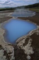 Thermal pool with rising steam.