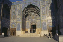 People standing at entrance to Lotfallah Mosque in Mediun E eman Square Isfahan