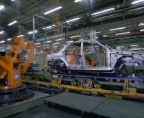 Ford Orion Car Production. Interior of factory with the shell of a silver car on production line. Automobile