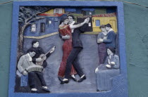 La Boca.  Painted tableau of tango dancers in the old port district.